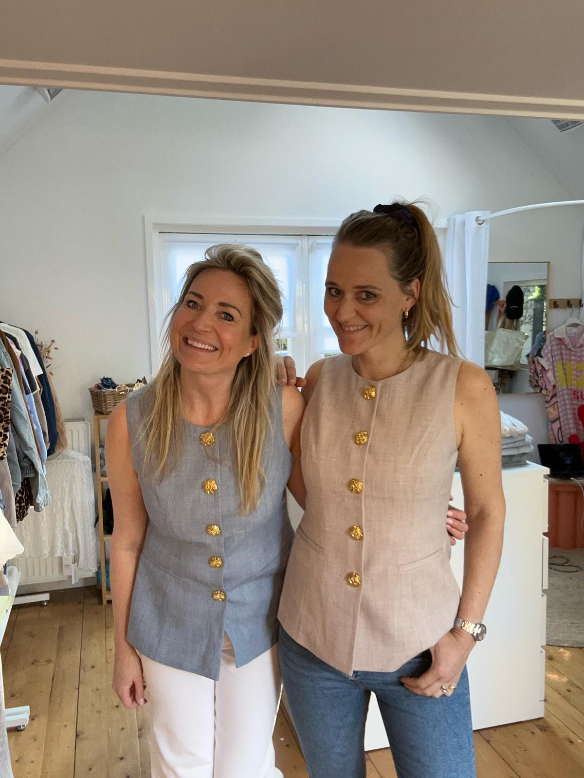 Gilet gouden knoop
